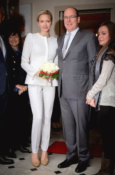 Prince Albert and Princess Charlene attended the Monaco Red Cross gifts distribution as part of the National Day ceremonies in Monte-Carlo