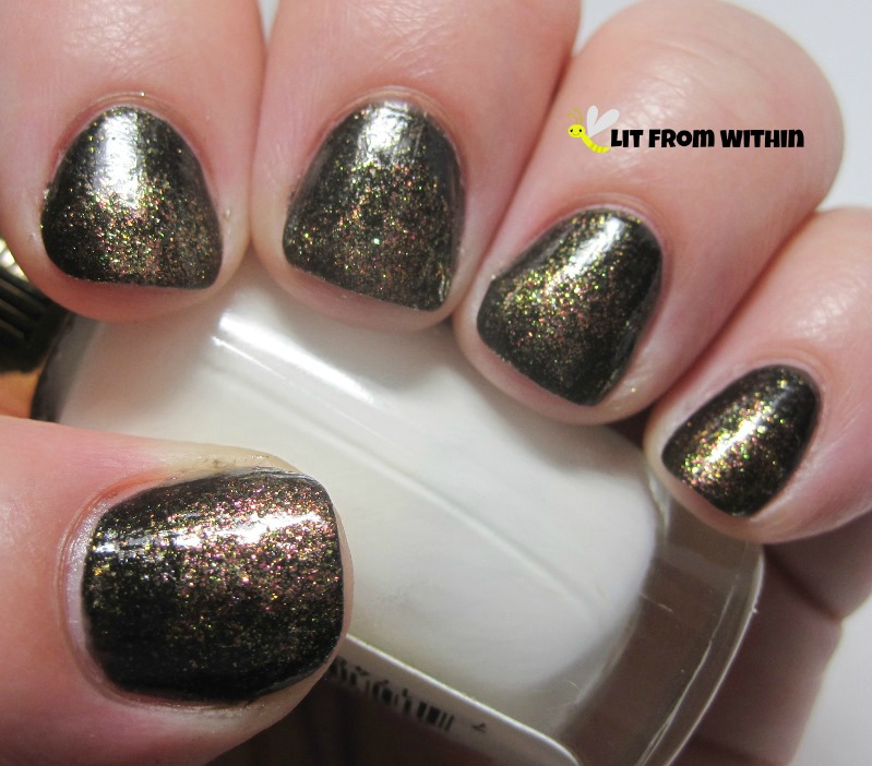 Cover Girl Seared Bronze, a pink/bronze polish with some of the same green/gold duochrome glitters as Black Heat
