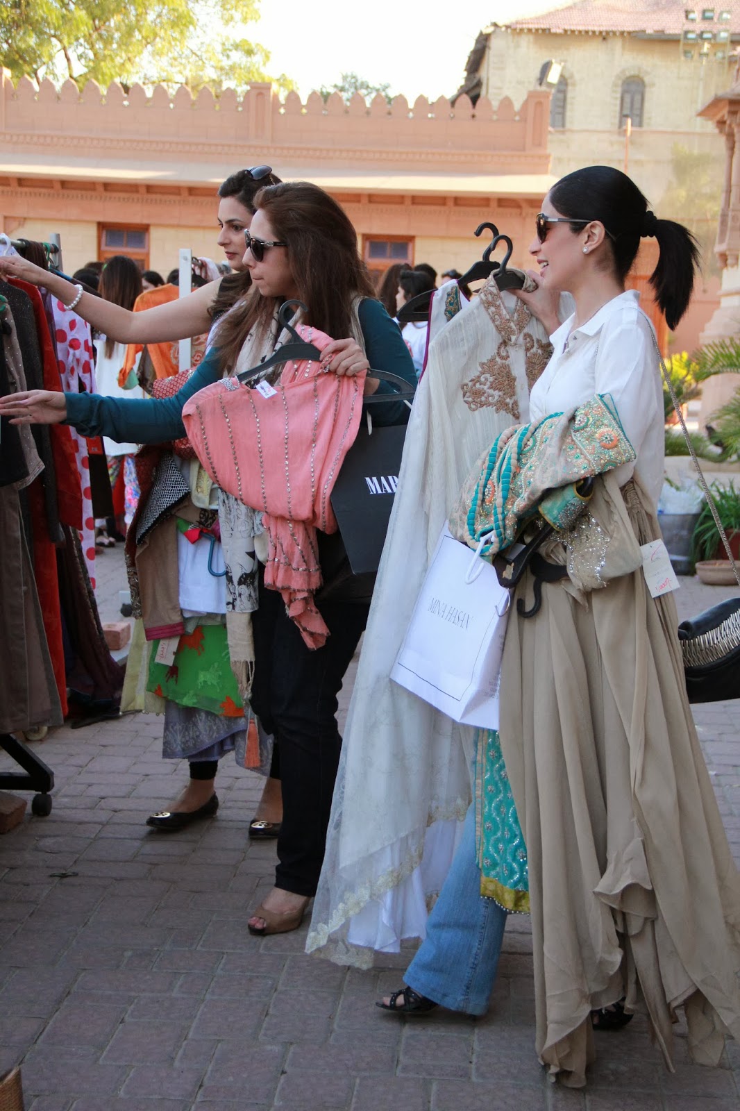 shoppers at Mohatta Palace - Pakistani fashion charity trunk show for the Sindh Festival