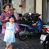 Armless little girl, grandma happy together in Ho Chi Minh City