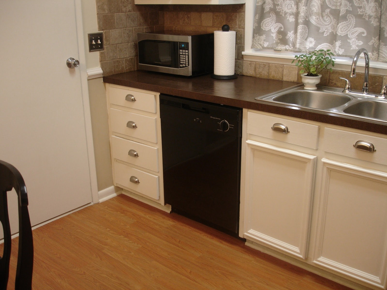 Don't Disturb This Groove: Kitchen Cabinets Updated With Moulding