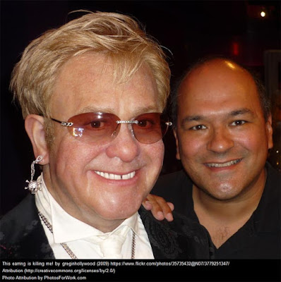 Elton John with partner