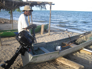 Belizean dugout canoe with outboard engine