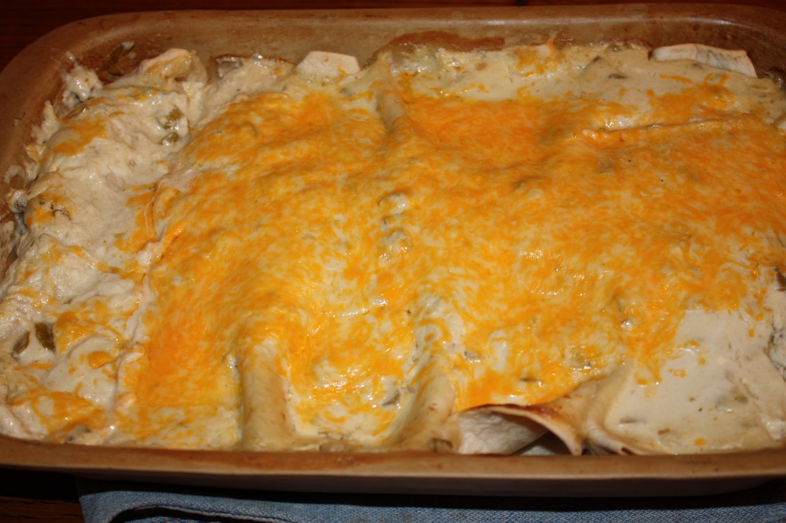 Busy Hands Busy Minds: Chicken Enchiladas with Creamy Green Chili Sauce for a Crowd or the Freezer