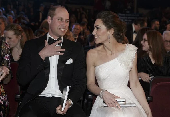 Kate Middleton, the Duchess of Cambridge wearing Princess Diana's pearl earrings, Alexander McQueen one shoulder gown