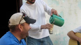 Pouring terere or mate in Paraguay