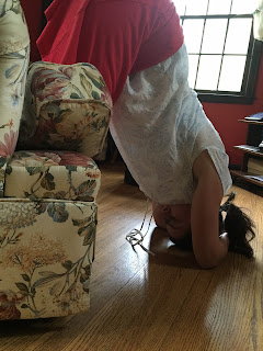 Spinning Babies Anisa asked, "Can anyone guide me about Forward-leaning inversion? What should be the height of the couch from which we are going to lean downwards."