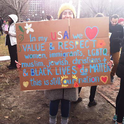 Boston Women's March sign: "In my USA we VALUE & RESPECT  women, immigrants, LGBTQ, Muslim, Jewish, Christians, &  BLACK LIVES *do* MATTER. This is still our nation."