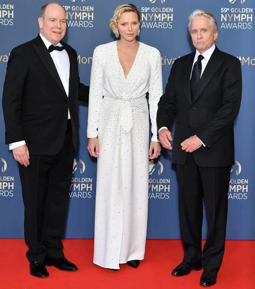 Golden Nymph Award Michael Douglas. Princess Charlene is wearing Carolina Herrera dress. Maria Carolina, Princess Camilla and Maria Chiara