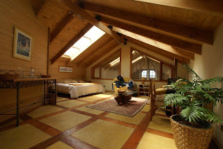 PALACIO EN MADERA AL SUR DEL MUNDO: Pasillos y jardines interiores