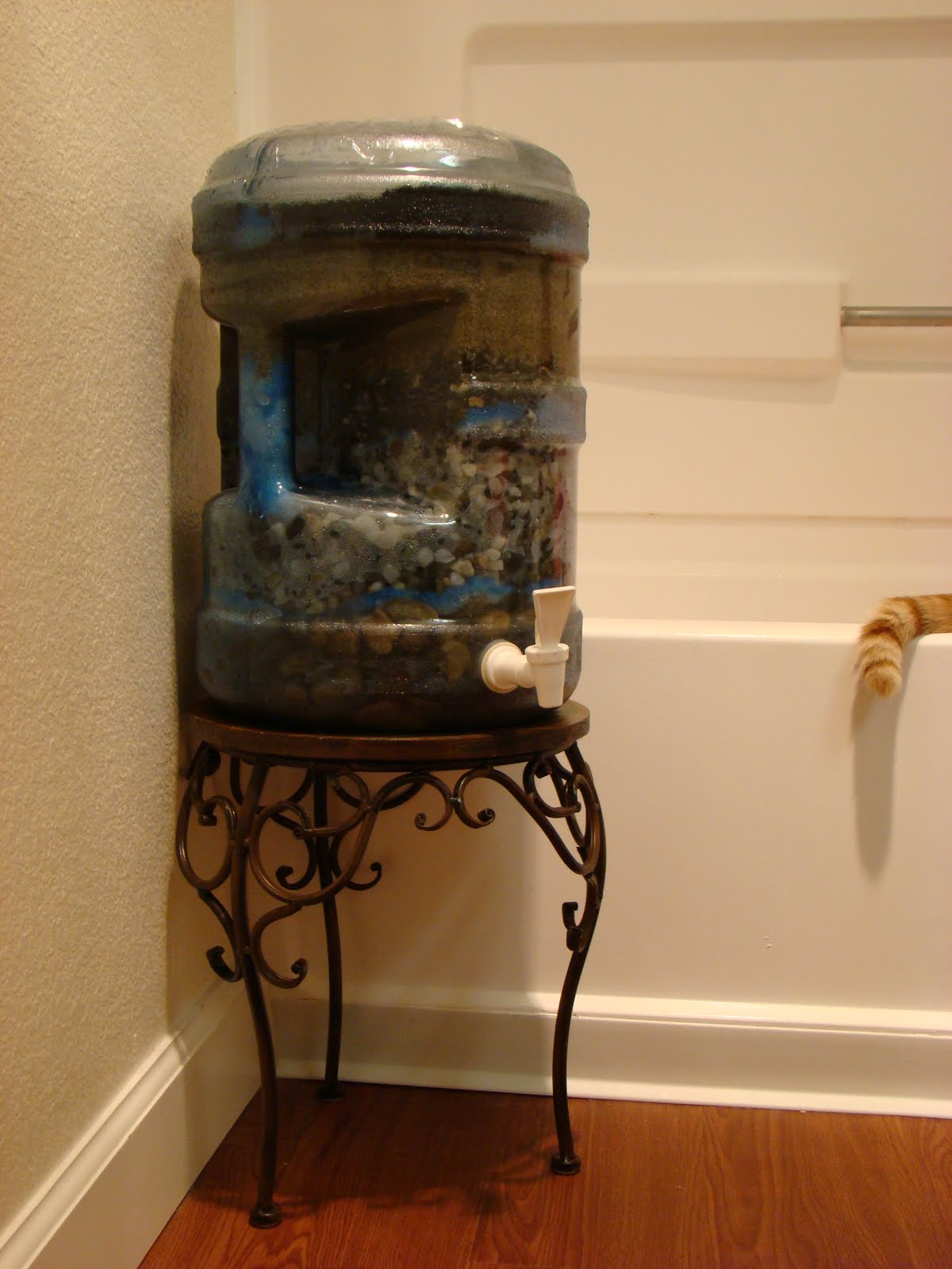 Ancient Green Building a SandGravel Filter.