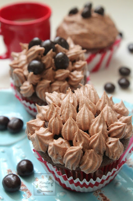 A delicious burst of coffee goodness in every bite of these Chocolate Cappuccino Cupcakes with a luscious espresso-flavored buttercream frosting! Perfect pair with your morning coffee! 