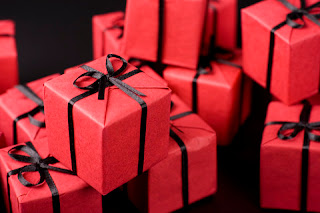 black and red wrapped holiday presents