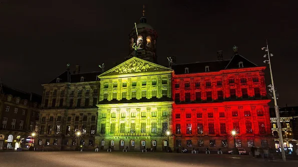 Royal Palace in Amsterdam lighten up with the colors of the Belgian flag as support for the Belgian people after te terror attacks