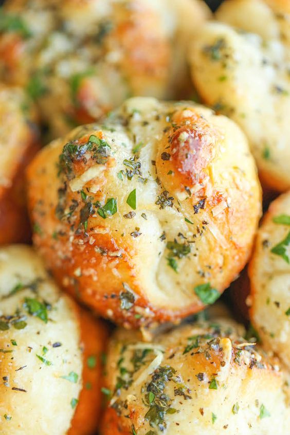 Mini garlic bread bites slathered in buttery goodness and stuffed with melted mozzarella cheesiness. So good and irresistible! Garlic bread with mozzarella stuffed right in. Seriously. It's pretty epic. And when you use refrigerated biscuits, this pretty much comes together in just 6 minutes, 22...