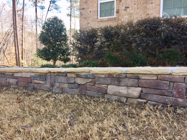 Two Brothers Landscaping, LLC: Cinder block and stone veneer it's quite