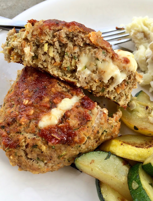 Inside view of a vegetable and mozzarella mini turkey meatloaf.