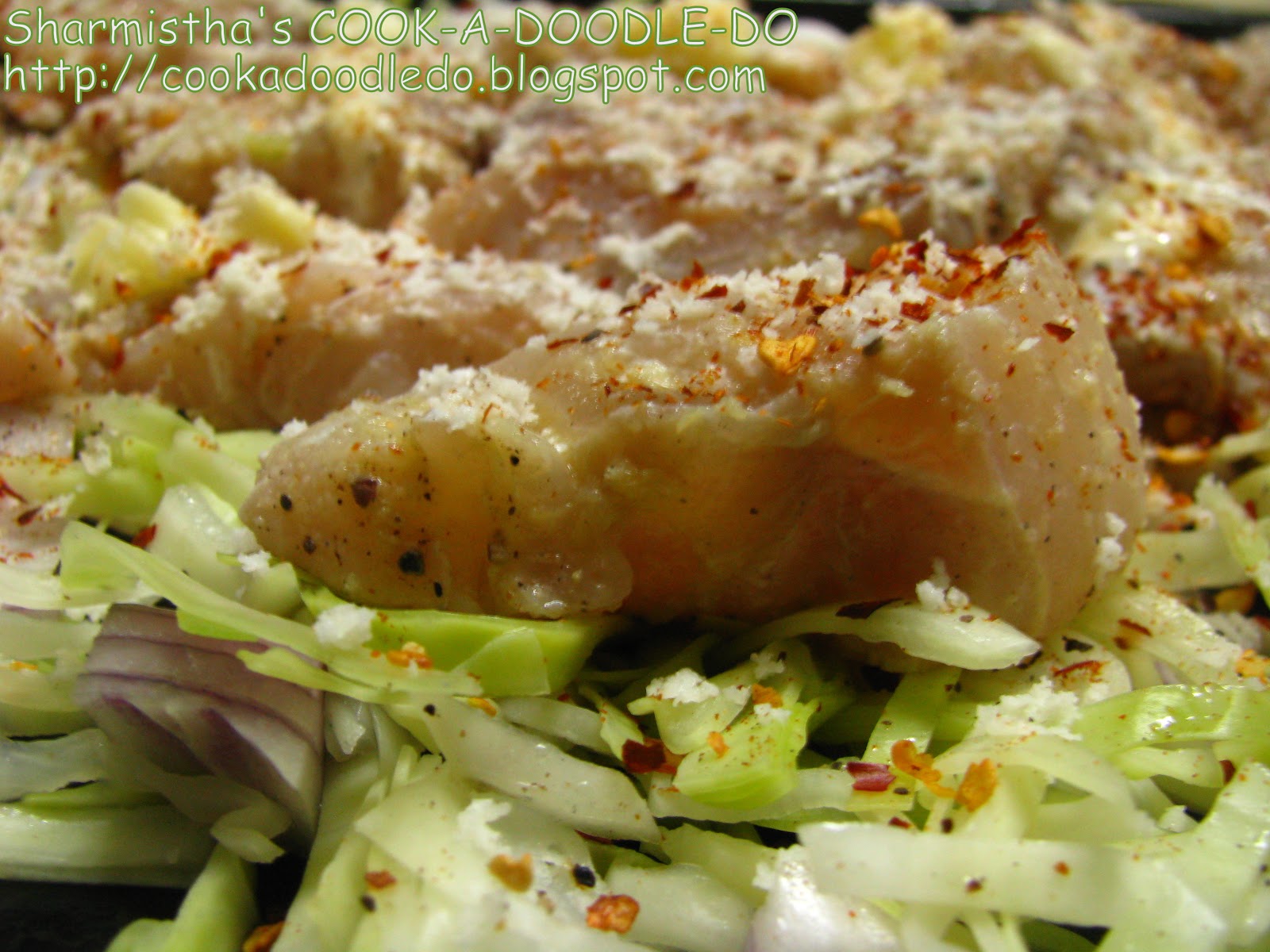 COOKADOODLEDO Baked Fish (Bhetki) on a bed of grated Cabbage