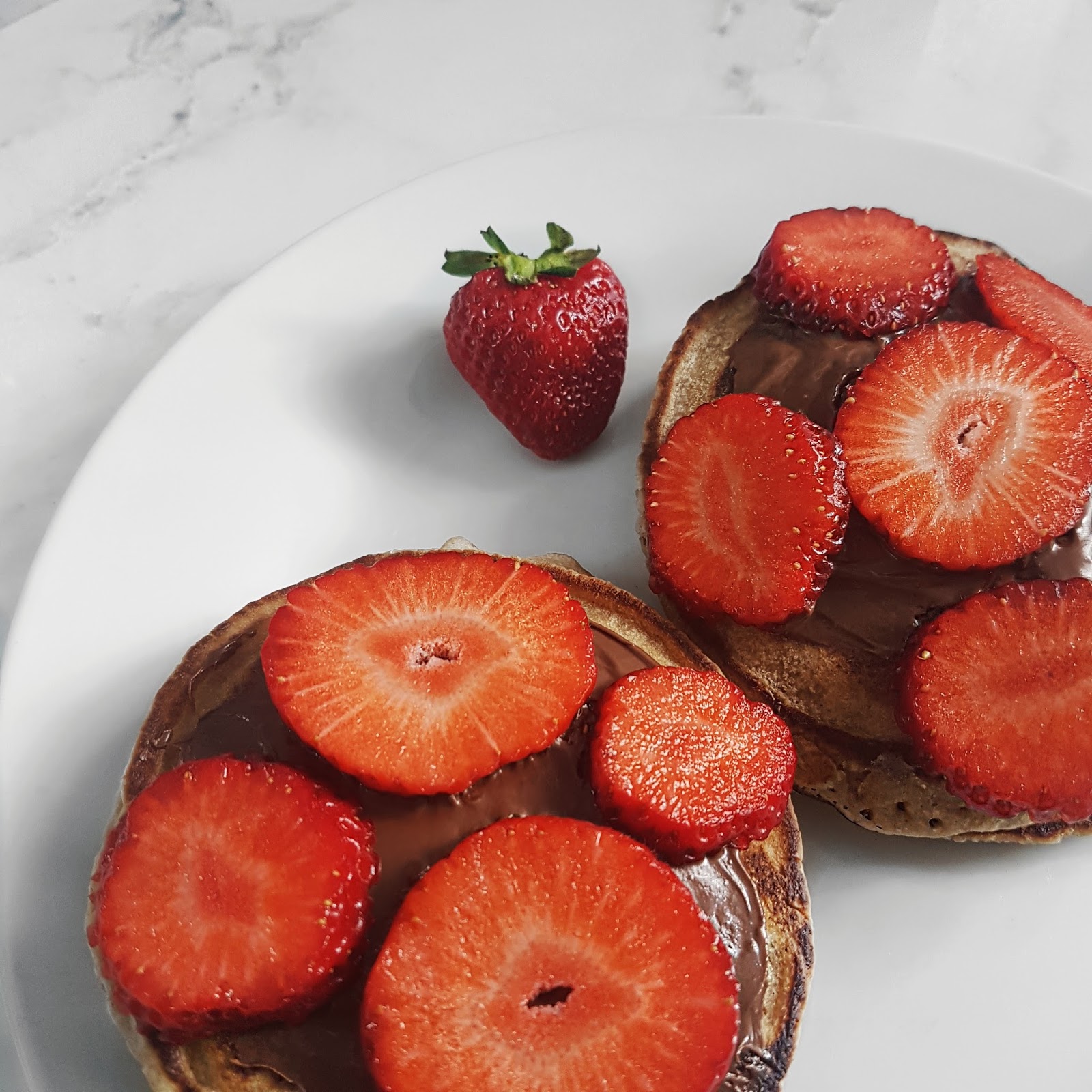 Pancakes, nutella and strawberries