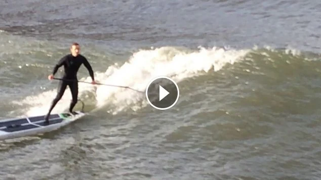 Surfers On The River Urumea