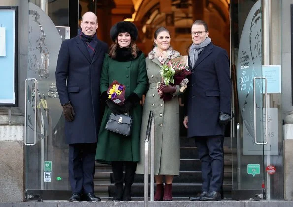 Kate Middleton wore a new bespoke Catherine Walker coat and dress. Duchess accessorised her coat with a faux fur collar and faux fur cuffs from Troy London