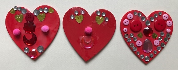 Decorated wooden heart magnets for Valentine's Day