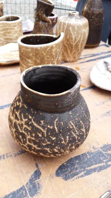 Finished pottery from obvara raku firing.