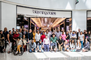 Source: Al Tayer Group. Students from Mawaheb pose outside Bloomingdale's during the launch of the Ramadhan windows.    
