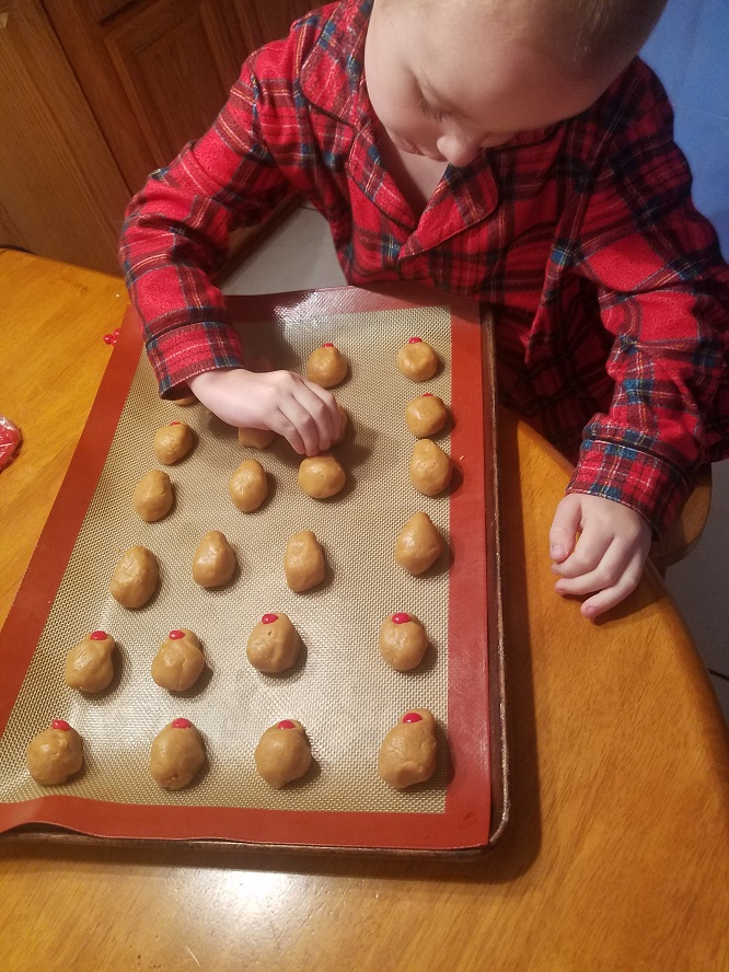 this is a delicious peanut butter cookie that my grandson Antonio and I made for the Christmas holiday shaped into reindeer