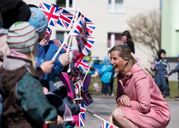 Countess Sophie of Wessex wore Suzannah Kaleidoscope Neat Tweed Dress, Patrick Mavros pangolin earrings and Prada Suede shoes