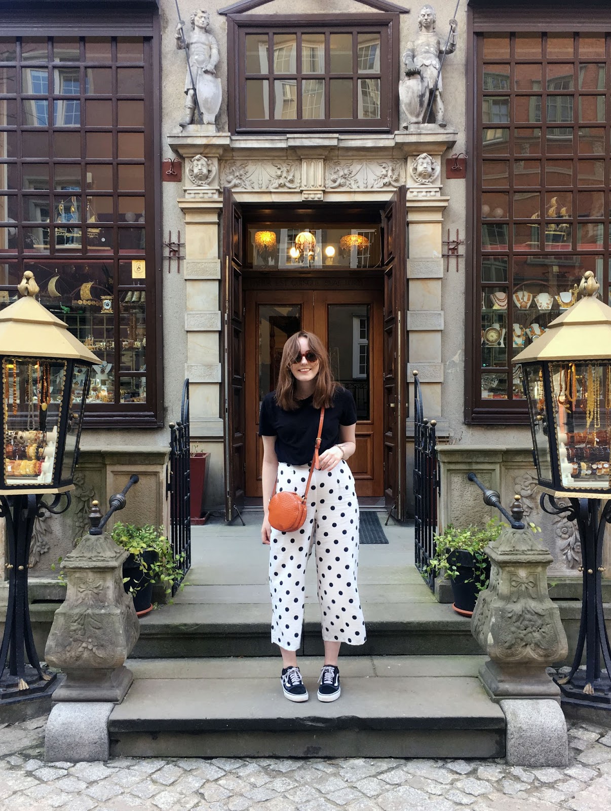 fashion and travel blogger outfit in Gdansk featuring topshop polka dot trousers