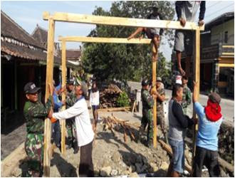 KORAMIL KALIJAMBE BEKERJASAMA DENGAN AKS BEDAH RUMAH WARGA