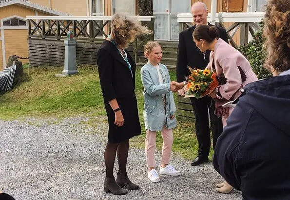 Crown Princess Victoria wore Andiata Odnala wool jacket in pink, and ByTiMo flared bell sleeve dress at research vessel