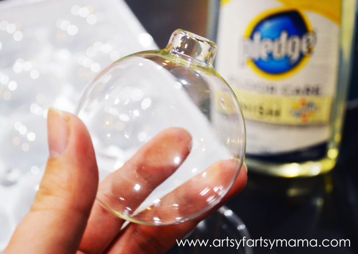 DIY Glitter Ornaments at artsyfartsymama.com #glitteratmichaels #Christmas