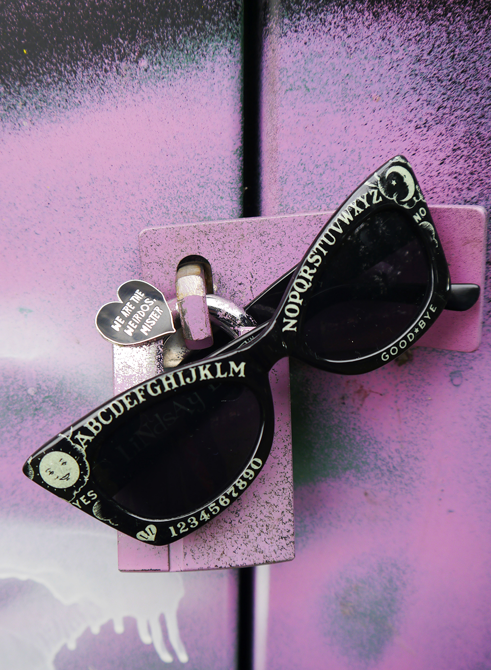 Halloween accessories by Punky Pins and Lindsay Lowe The Craft enamel pin and ouija board sunglasses - accessories for a Nancy Downs inspired Halloween costume
