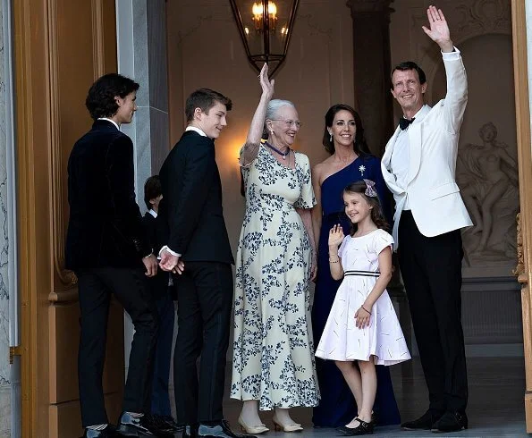 Crown Princess Mary wore a gown by Jesper Høvring. Princess Marie wore a gown by Rikke Gudnitz. Princess Isabella, Princess Alexandra