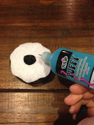 Glueing the icing on the DIY toy donuts