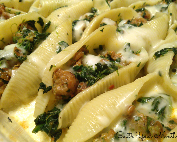 Sausage and Spinach Stuffed Shells with Garlic Cream Sauce | A rustic, simple recipe for stuffed pasta shells with Italian sausage, spinach and mozzarella topped with an easy garlic cream sauce.