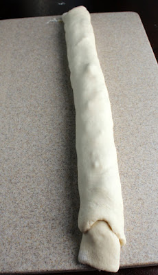 bread dough rolled around cheddar and bacon filling