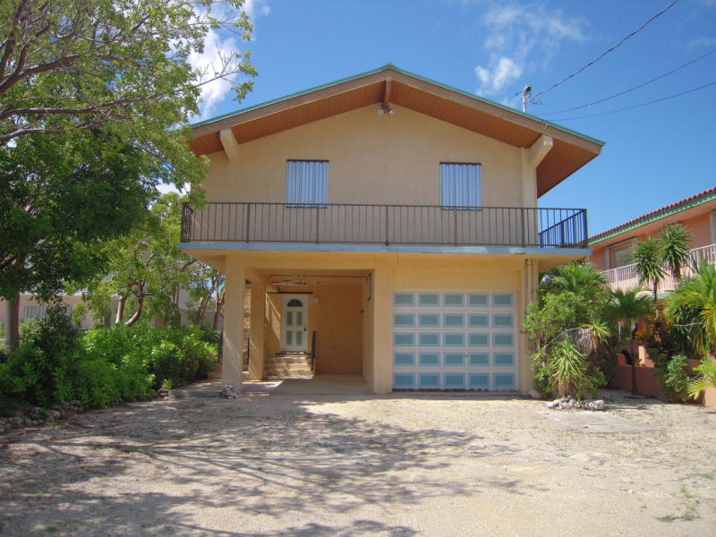 Real Estate in the Florida Keys New REO Canal Front in Plantation Key 385K