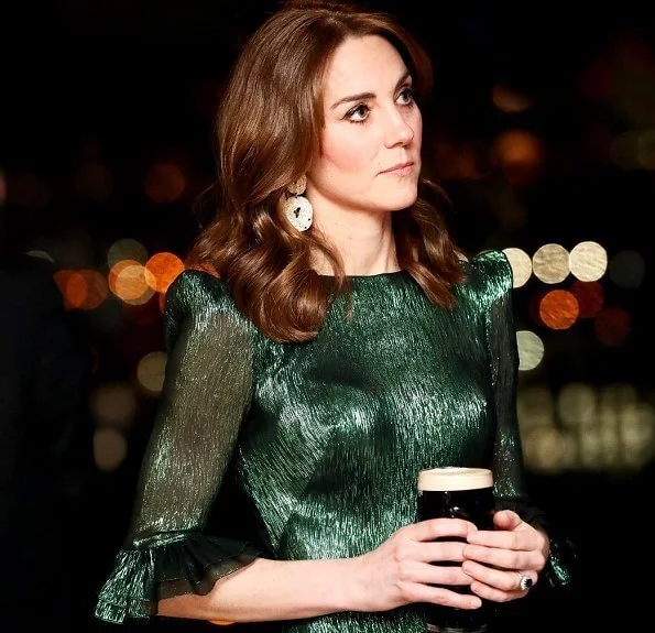 Kate Middleton wore The Vampire's Wife Falconetti emerald midi dress, Brora gold charm earrings. Meghan Markle