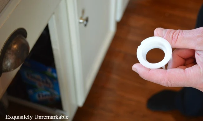 White plastic ring for soap dispenser