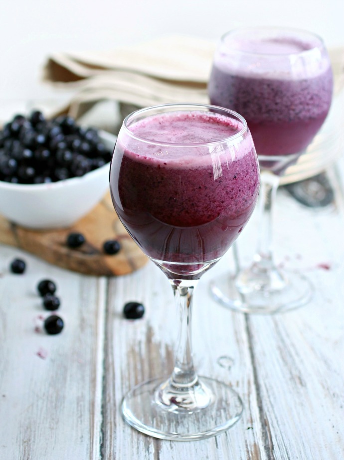 Recipe for a vodka and wine cocktail with frozen blueberries and vanilla ice cream.