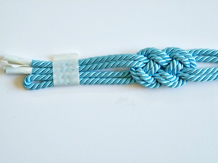 Make a knotted cord bracelet