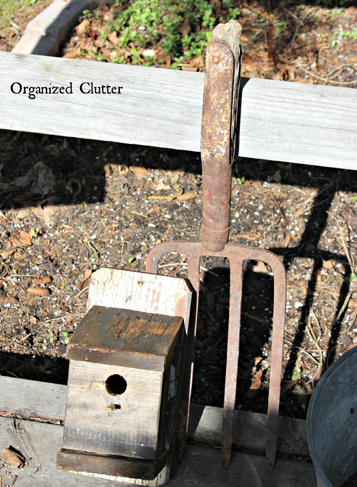 Decorating the Deck with Rustic Birdhouses - Organized Clutter