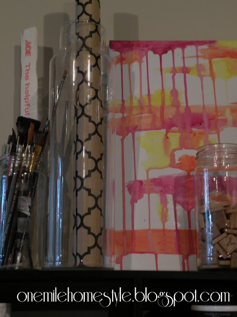 Clear jars for organizing paint brushes