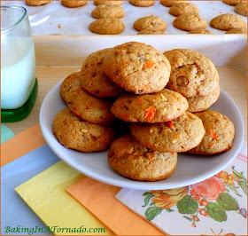 Cinnamon Toffee Carrot Cookies, a chewy cookie featuring many flavors of a carrot cake with a few surprises. If you like a cookie that's not overly sweet, this is the one for you. | Recipe developed by www.BakingInATornado.com | #recipoe #cookies #bake