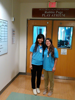  Maleah and me in front of UNC  Children’s Hospital Pediatric Playroom