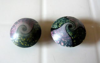 Polymer clay lentil swirl beads prior to cooking
