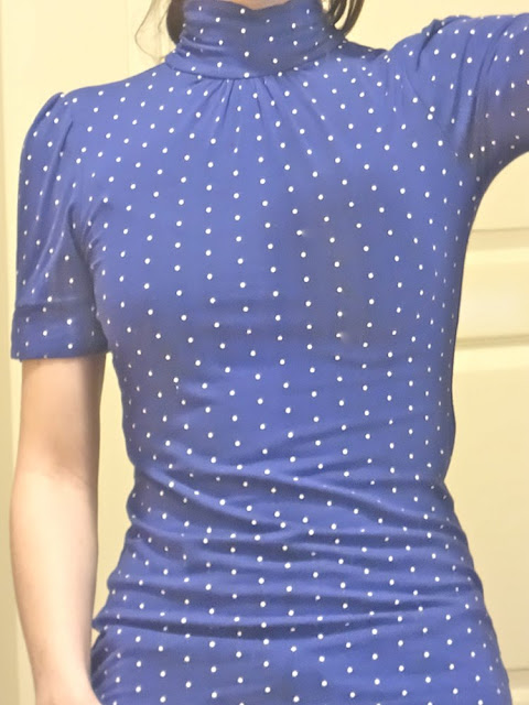 indigo shirt with white polka dots